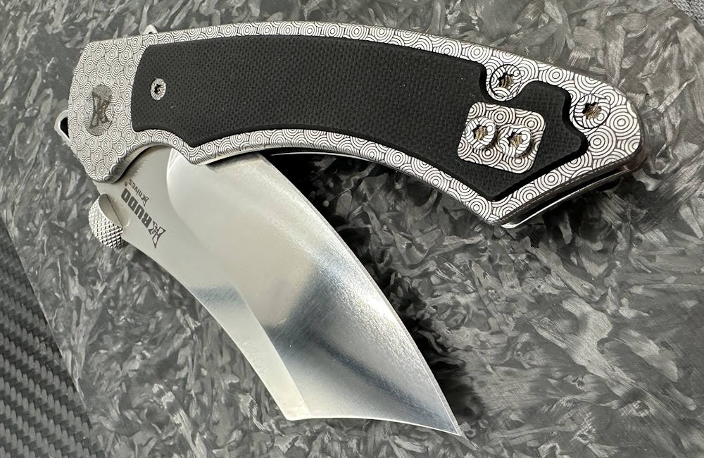 https://www.krudoknives.com/wp-content/uploads/2023/08/laser-engraving-on-Krudo-Knives.jpg